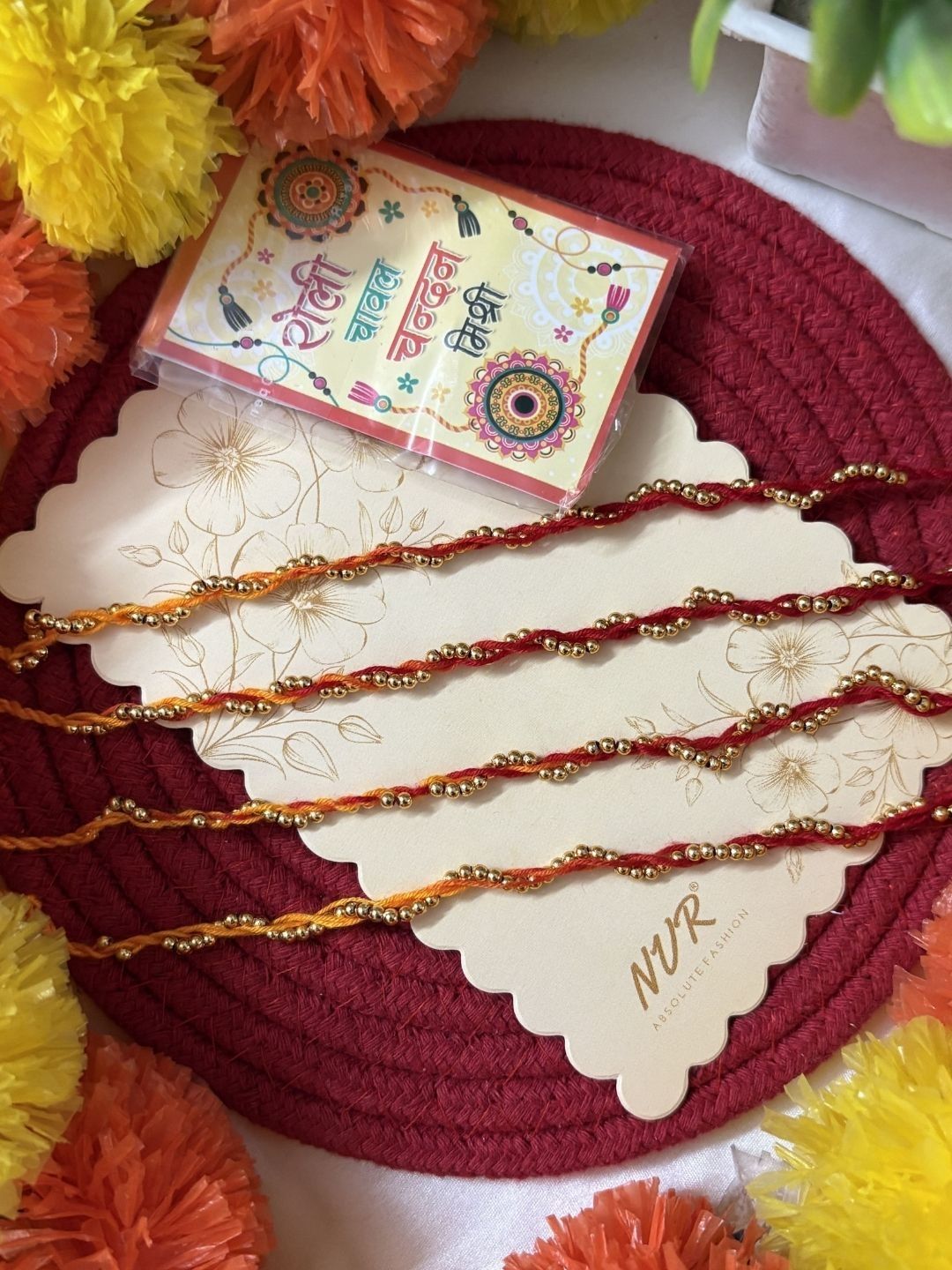 Anouk Set Of 4 Yellow & Red Thread Rakhi With Roli Chawal Chandan Mishri