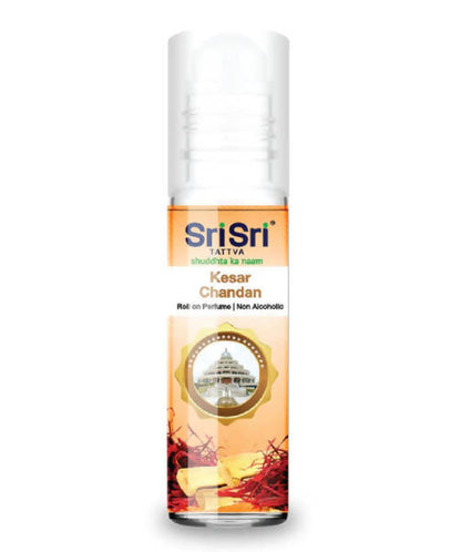 Sri Sri Tattva Kesar Chandan Roll-on Perfume for skin care with a floral and woody scent, in a clear glass bottle with a roller applicator.