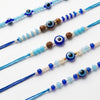 Dhiyona Set Of 5 Blue Evil Eye Thread Rakhi With Roli Chawal Chandan Mishri