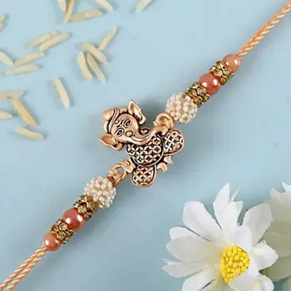 Enticing Ganesha Rakhi & Snickers Almond Chocolate