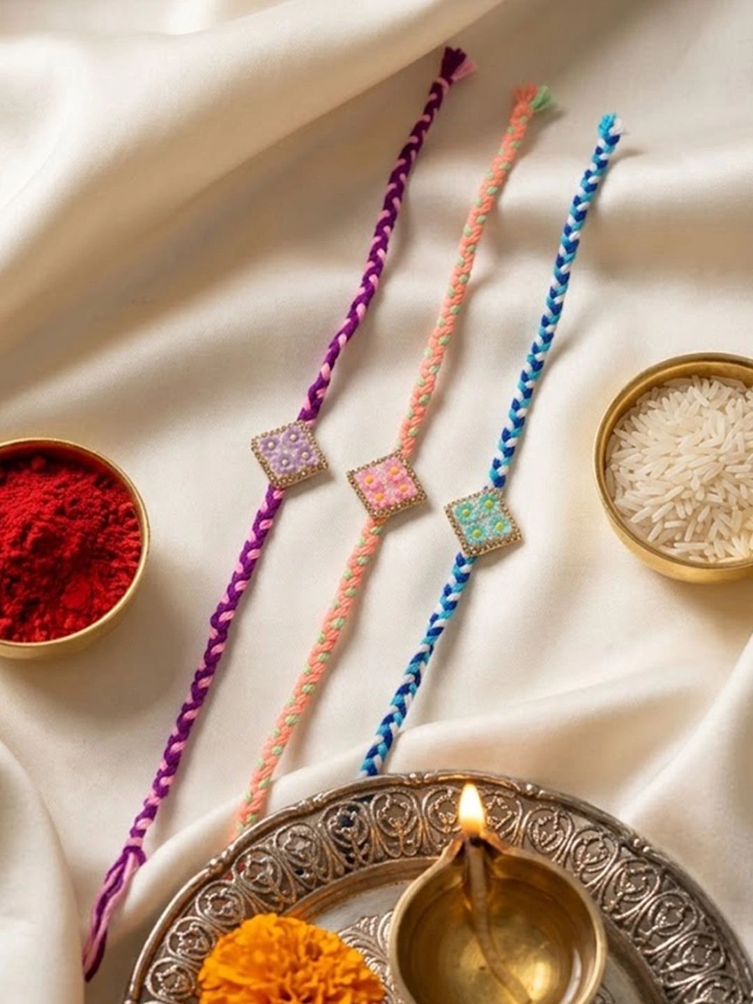 Anouk Set Of 3 Multicolor Ad Thread Rakhi With Roli Chawal Chandan Mishri