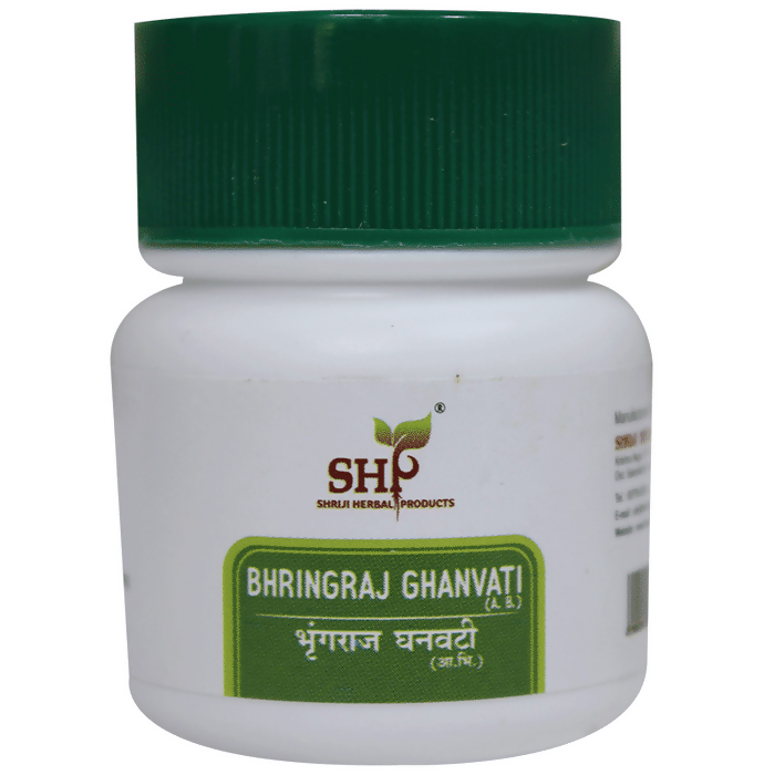 Shriji Herbal Products Bhringraj Ghanvati Ayurvedic tablets in a clear bottle with tablets visible inside.
