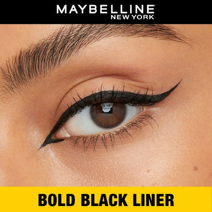 Maybelline New York Colossal Bold Pencil Eyeliner in black matte finish, featuring a close-up of the eyeliner pencil with sharp tip.