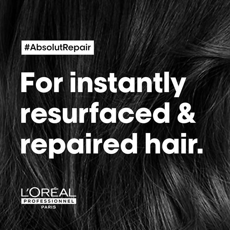 L'Oreal Professionnel Absolut Repair shampoo and hair mask from Serie Expert, shown in a sleek hair care product set.