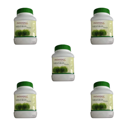 Patanjali Wheat Grass Powder in a natural, green powder form, packaged in a clear container, part of Ayurvedic health products.