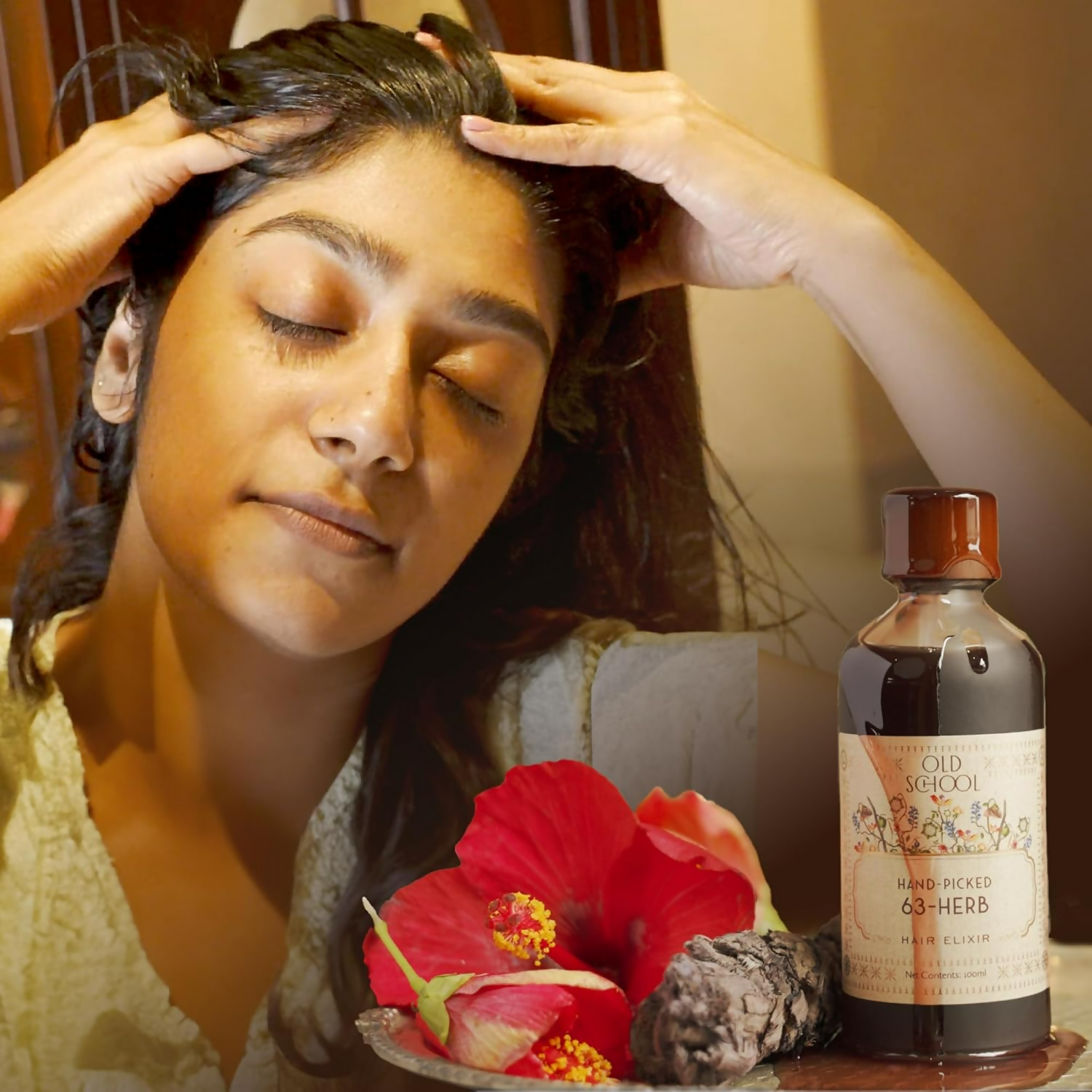 Old School Rituals 63-Herb Hair Elixir bottle with natural herbal ingredients for promoting strong, healthy hair growth.