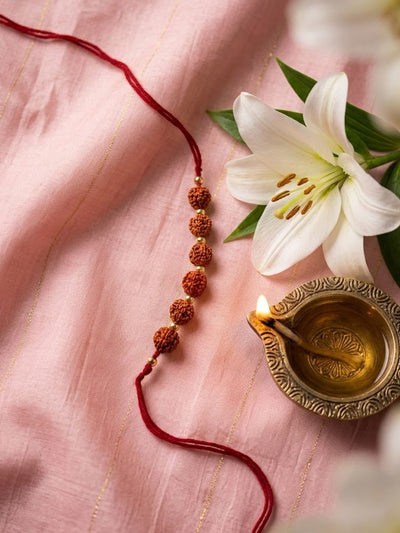 Indyancart Religious Rudraksh Thread Rakhi With Roli Chawal Chandan Mishri