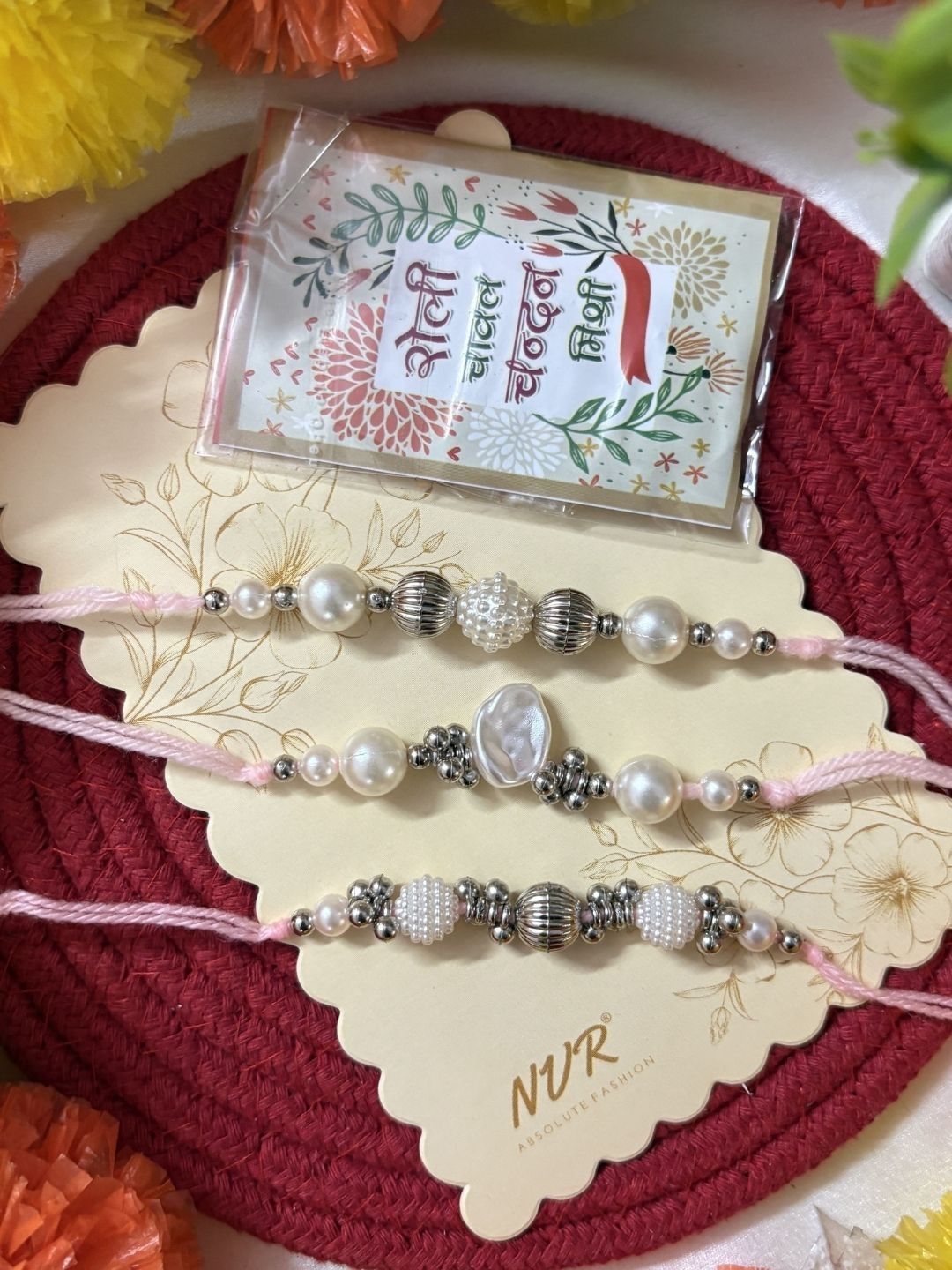 Anouk Set Of 3 White Pearls Thread Rakhi With Roli Chawal Chandan Mishri