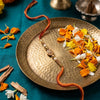 Dhiyona Set Of 10 Artificial Stones & Beads Thread Rakhi With Roli Chawal Chandan Mishri