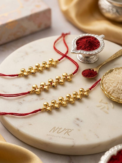 Anouk Set Of 3 Gold Toned Ghungroo & Red Thread Rakhi With Roli Chawal Chandan Mishri