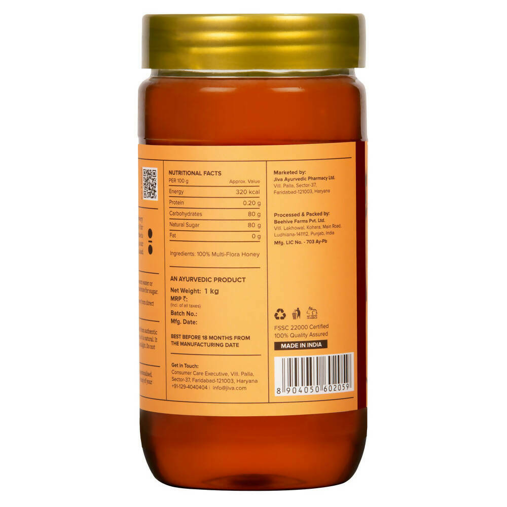 Jiva Ayurveda honey jar with a golden honey spread and natural packaging, showcasing pure Ayurveda honey product.