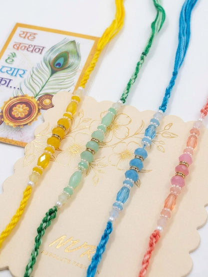 Anouk Set Of 4 Multicolor Artificial Beads Thread Rakhi With Roli Chawal Chandan Mishri