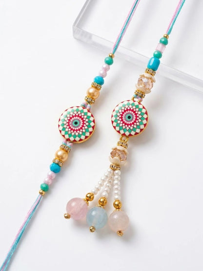Anouk Set Of 2 Floral Design Bhaiya Bhabhi Rakhi With Roli Chawal Chandan Mishri