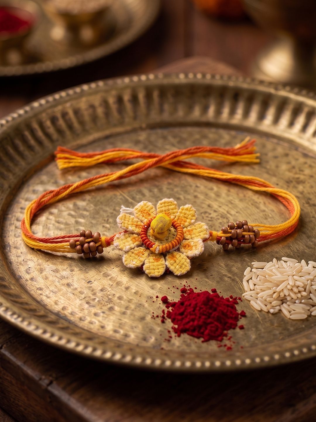 Anouk Yellow Floral Seed Thread Rakhi With Roli Chawal Chandan Mishri