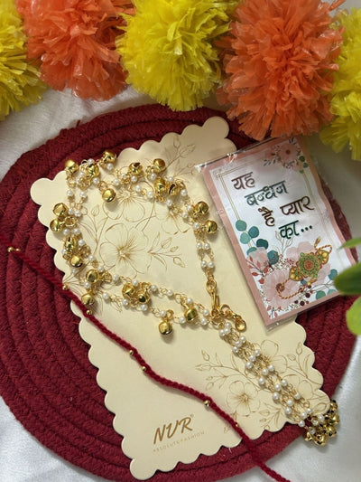 Indyancart Set Of 2 Pearls Gold Toned Bhaiya Bhabhi Rakhi With Roli Chawal Chandan Mishri