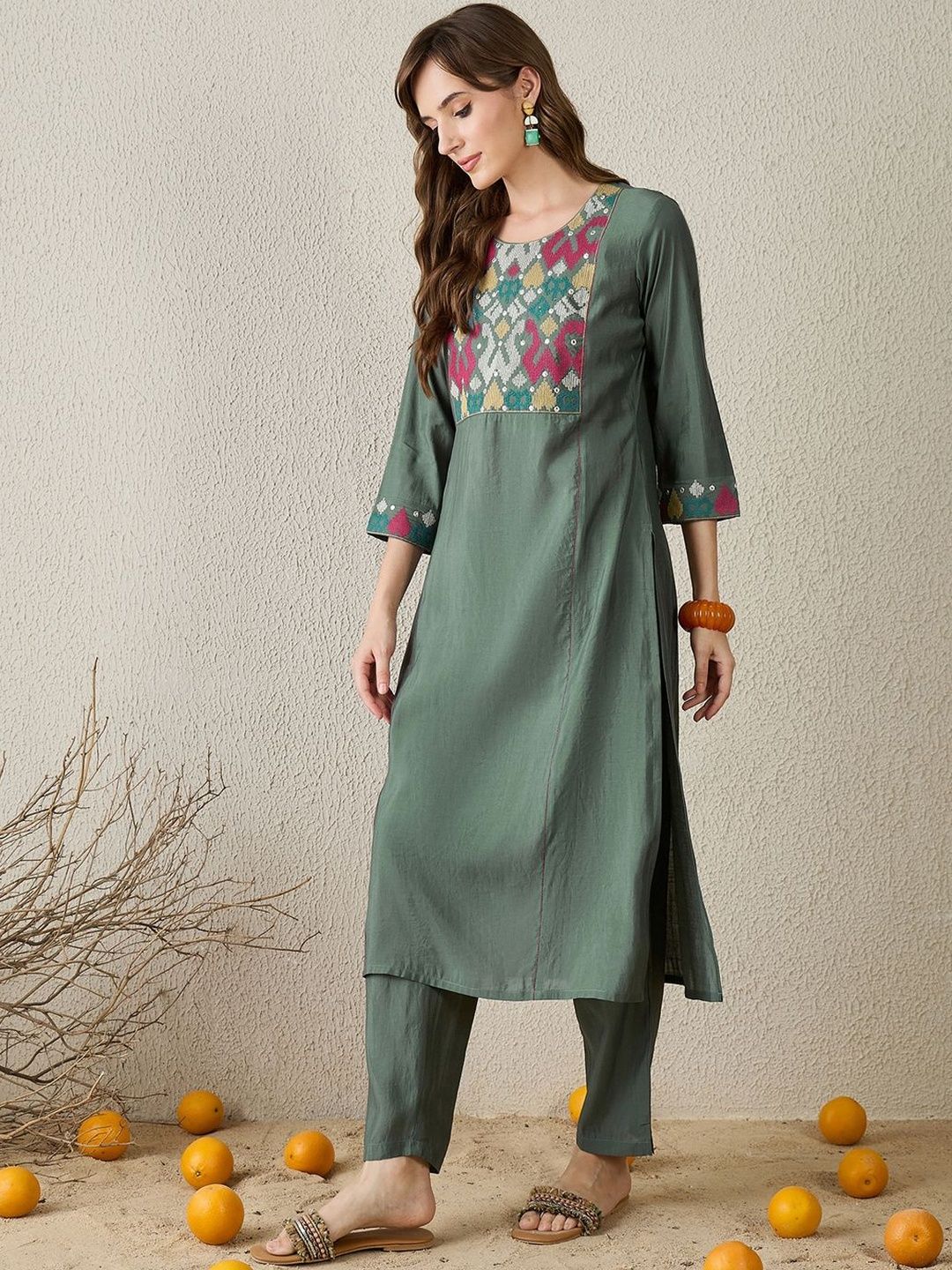 Women Embroidered Regular Thread Work Kurta with Trousers