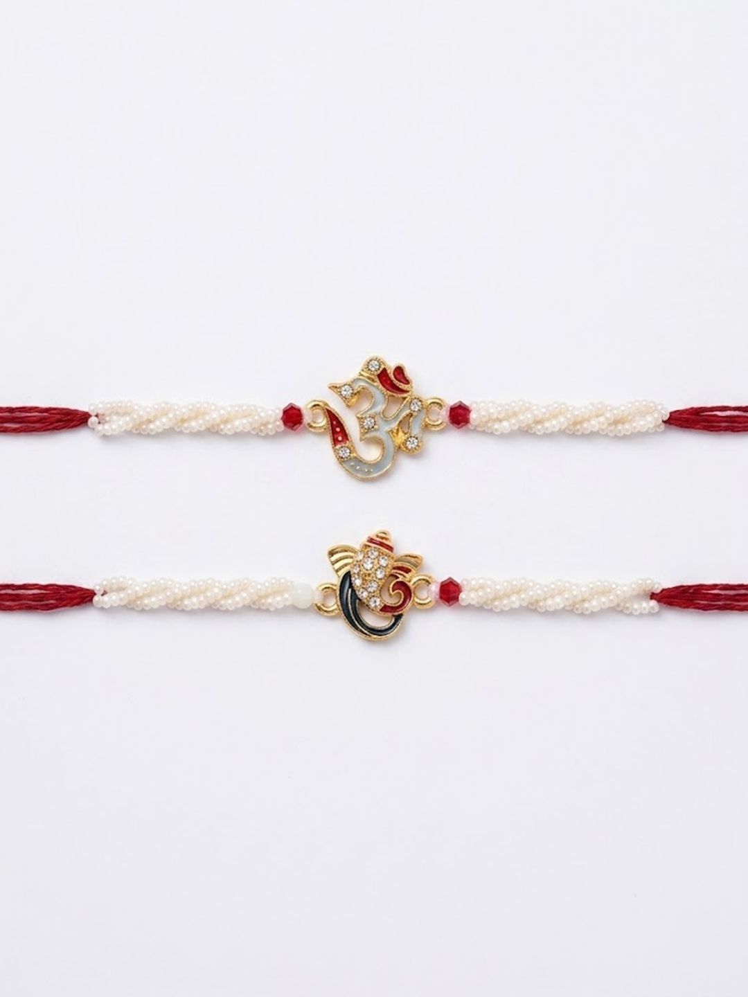 Anouk Set Of 2 White Pearls Om & Ganesh Ji Thread Rakhi With Roli Chawal Chandan Mishri