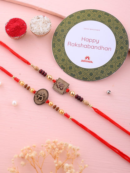 Anouk Set Of 2 Red Wooden Om Beaded Rakhi With Roli Rice & Greeting Card