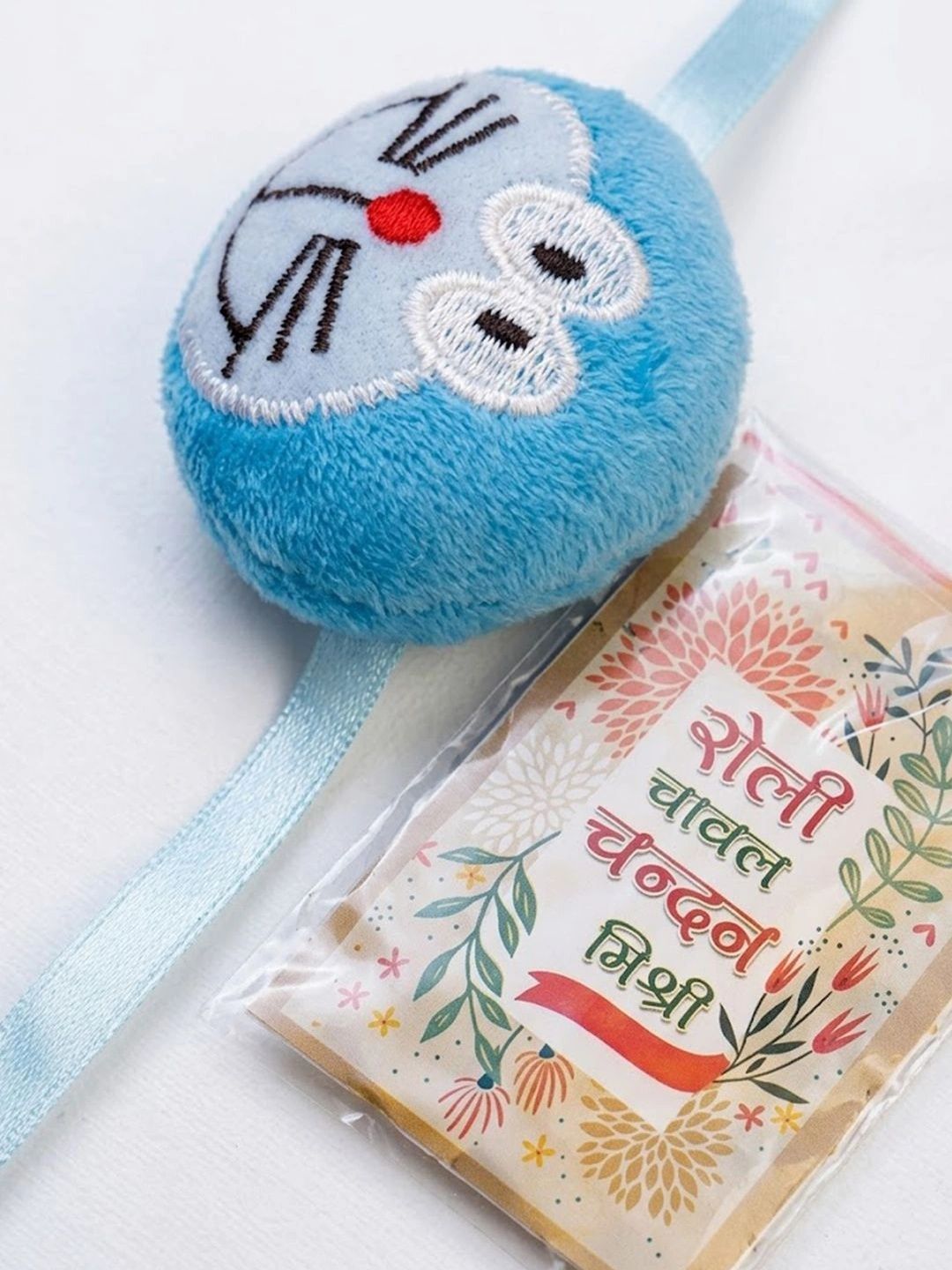 Anouk Kids Doremon Design Thread Rakhi With Roli Chawal Chandan Mishri