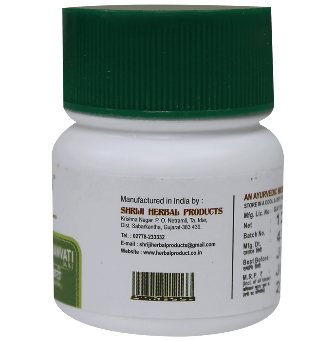 Shriji Herbal Products Bhringraj Ghanvati Ayurvedic tablets in a clear glass bottle with label and tablets inside.