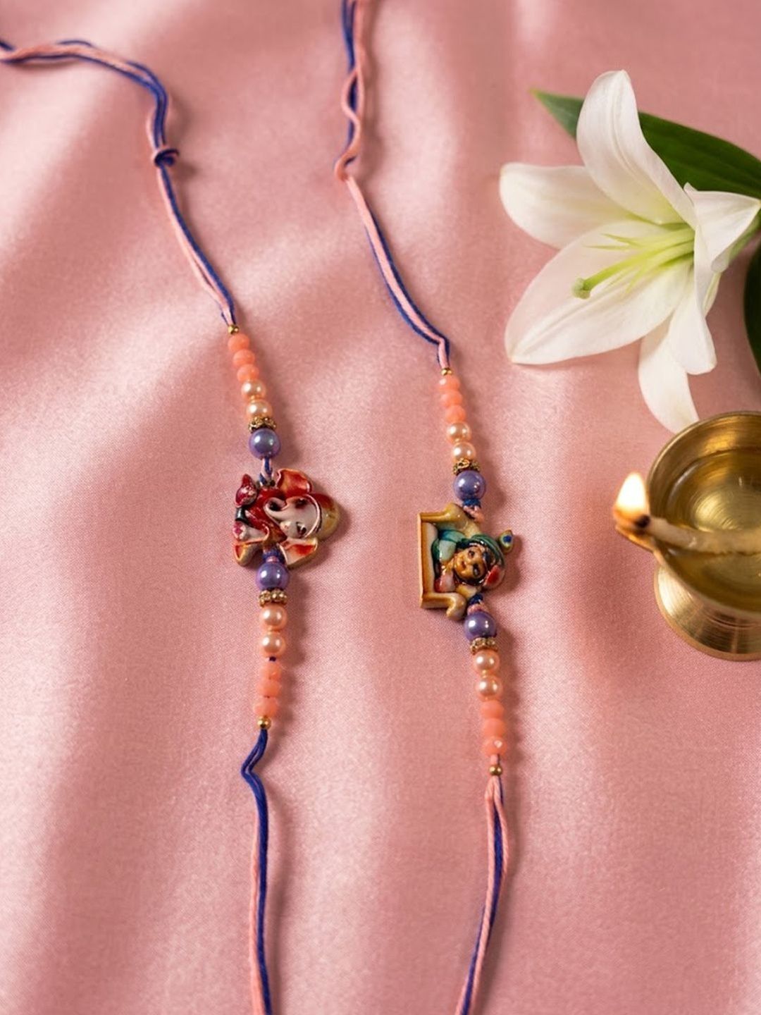 Anouk Set Of 2 Krishna Ji & Ganesh Ji Beaded Religious Thread Rakhi With Roli Chawal