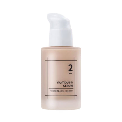 Numbuzin No.2 Face Serum in a clear glass bottle with dropper, showcasing the serum's smooth texture and branding on the label.