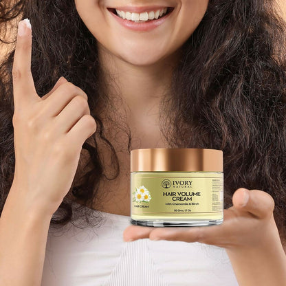Ivory Natural hair mask with ivory-colored cream for adding volume and fullness to natural hair, showing the product applied to hair.