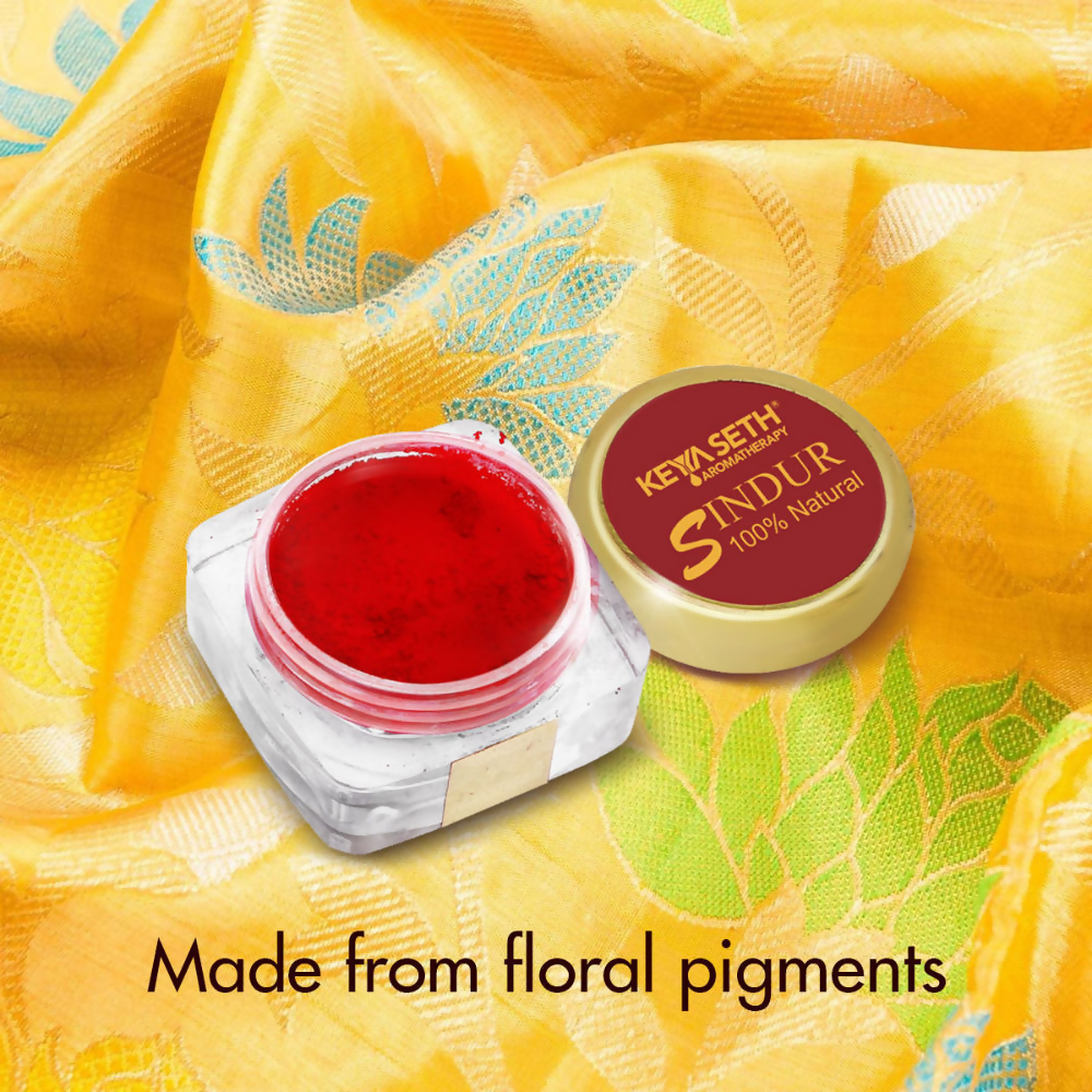 Keya Seth Aromatherapy Red Sindoor powder for traditional makeup, natural and vibrant in a small container.
