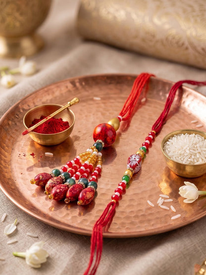 Anouk Set Of 2 Designer Red Artificial Beads Bhaiya Bhabhi Rakhi With Roli Chawal Chandan