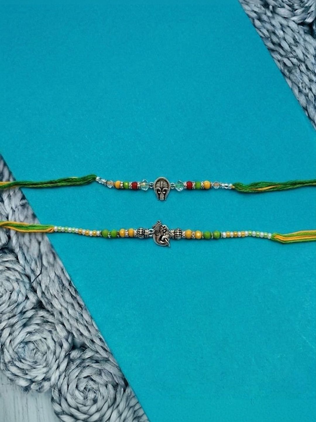 Anouk Set Of 2 Multicolor Religious Thread Rakhi With Roli Chawal Chandan Mishri