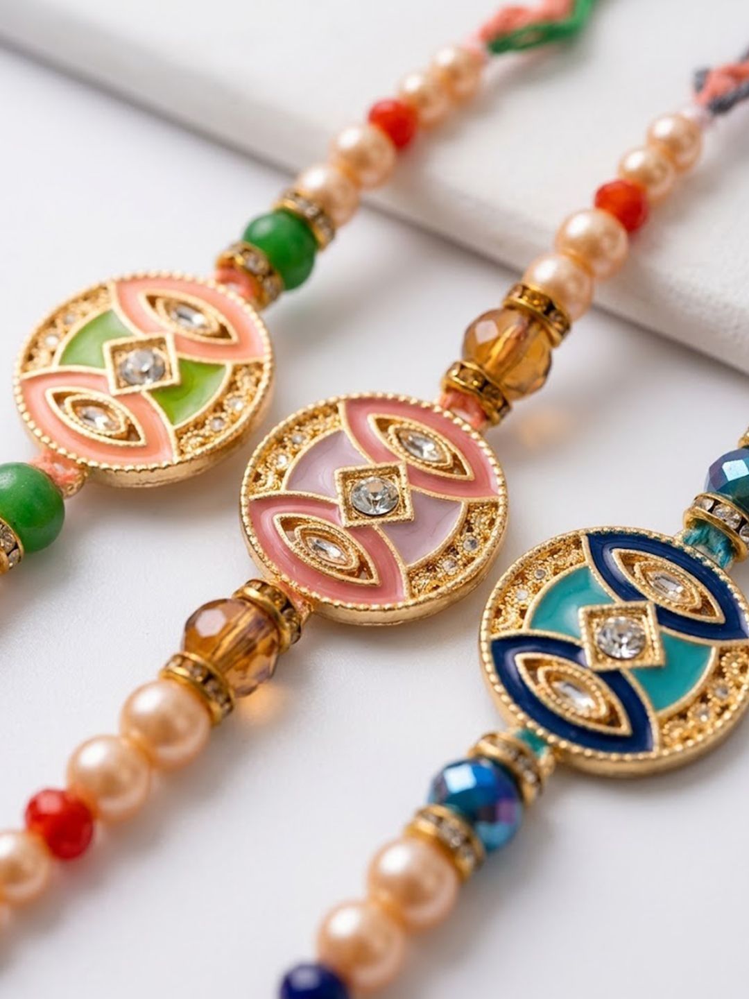 Anouk Set Of 3 Multicolor Artificial Stones & Beads Thread Rakhi With Roli Chawal Chandan