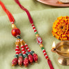 Dhiyona Set Of 2 Designer Red Artificial Beads Bhaiya Bhabhi Rakhi With Roli Chawal Chandan