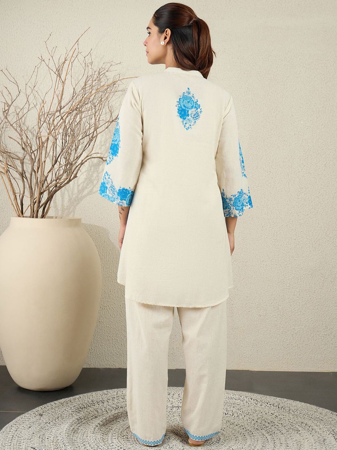 Women Floral Printed Cotton Kurta with Trousers