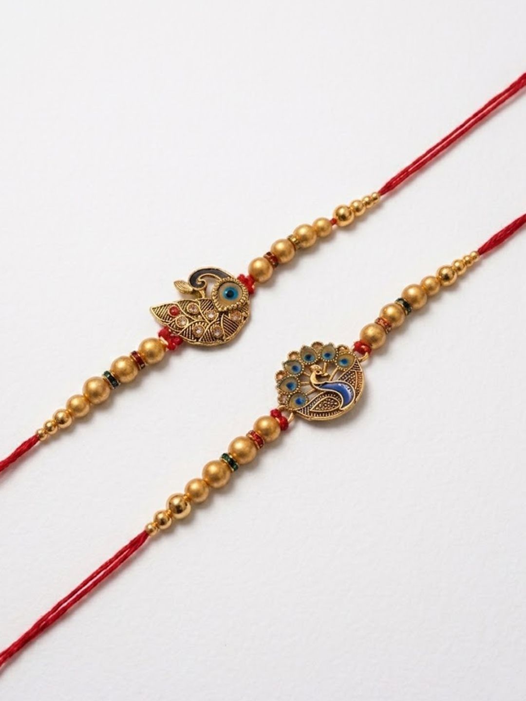Anouk Set Of 2 Peacock & Ghungroo Design Multicolor Thread Rakhi With Roli Chawal Chandan
