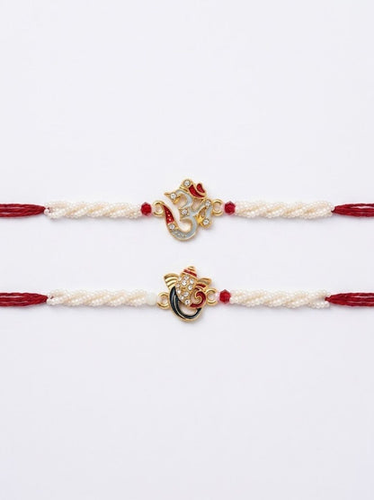 Anouk Set Of 2 White Pearls Om & Ganesh Ji Thread Rakhi With Roli Chawal Chandan Mishri