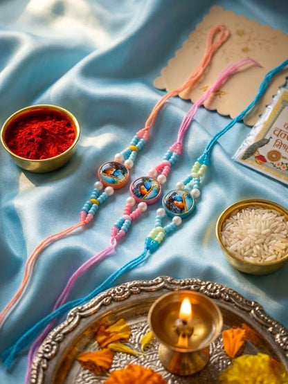 Anouk Set Of 3 Radha Krishna Thread Rakhi With Roli Chawal Chandan Mishri