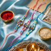 Dhiyona Set Of 3 Radha Krishna Thread Rakhi With Roli Chawal Chandan Mishri