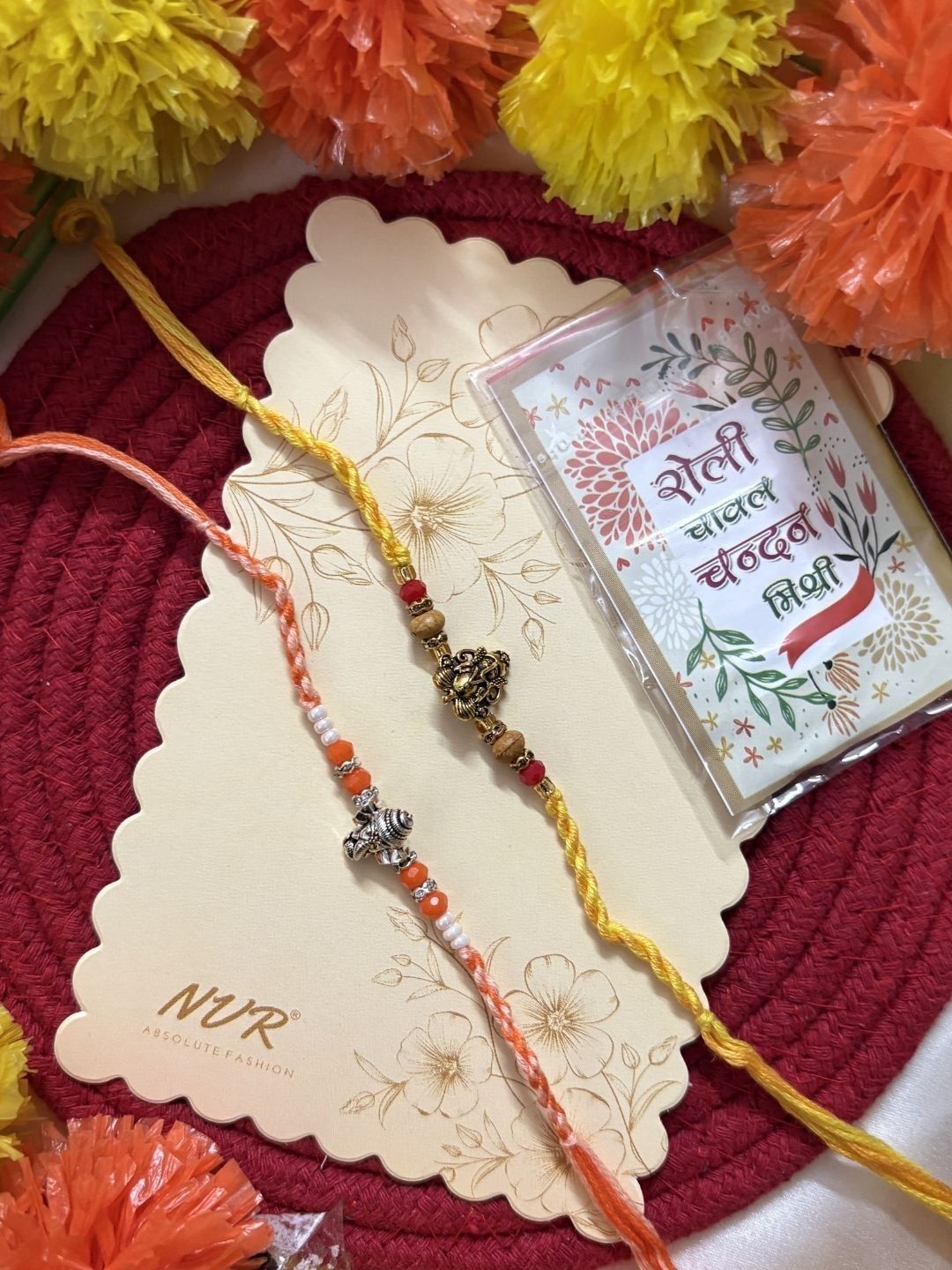 Anouk Set Of 2 Multicolor Religious Thread Rakhi With Roli Chawal Chandan Mishri