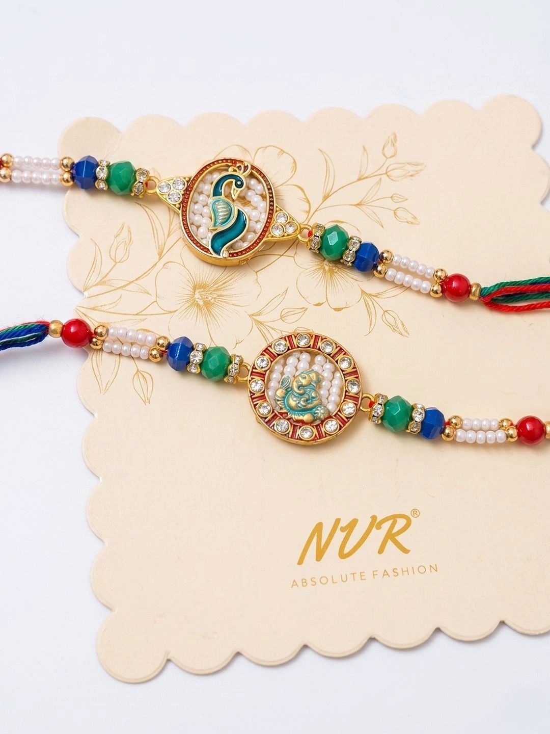 Anouk Set Of 2 Multicolor Peacock Design Rakhi With Roli Chawal Chandan Mishri