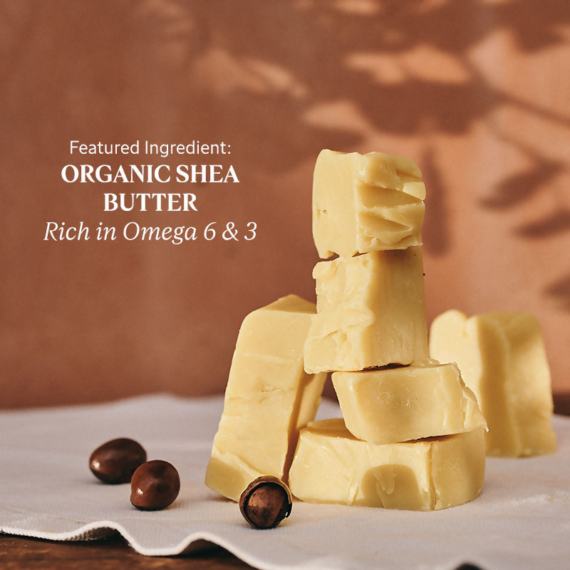 L'Occitane Shea Butter body lotion bottle with a pump dispenser, featuring a creamy, nourishing formula for hands and body.