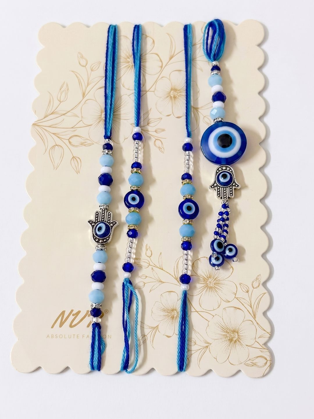 Anouk Set Of 4 Designer Blue Evil Eye Thread Rakhi With Roli Chawal Chandan Mishri
