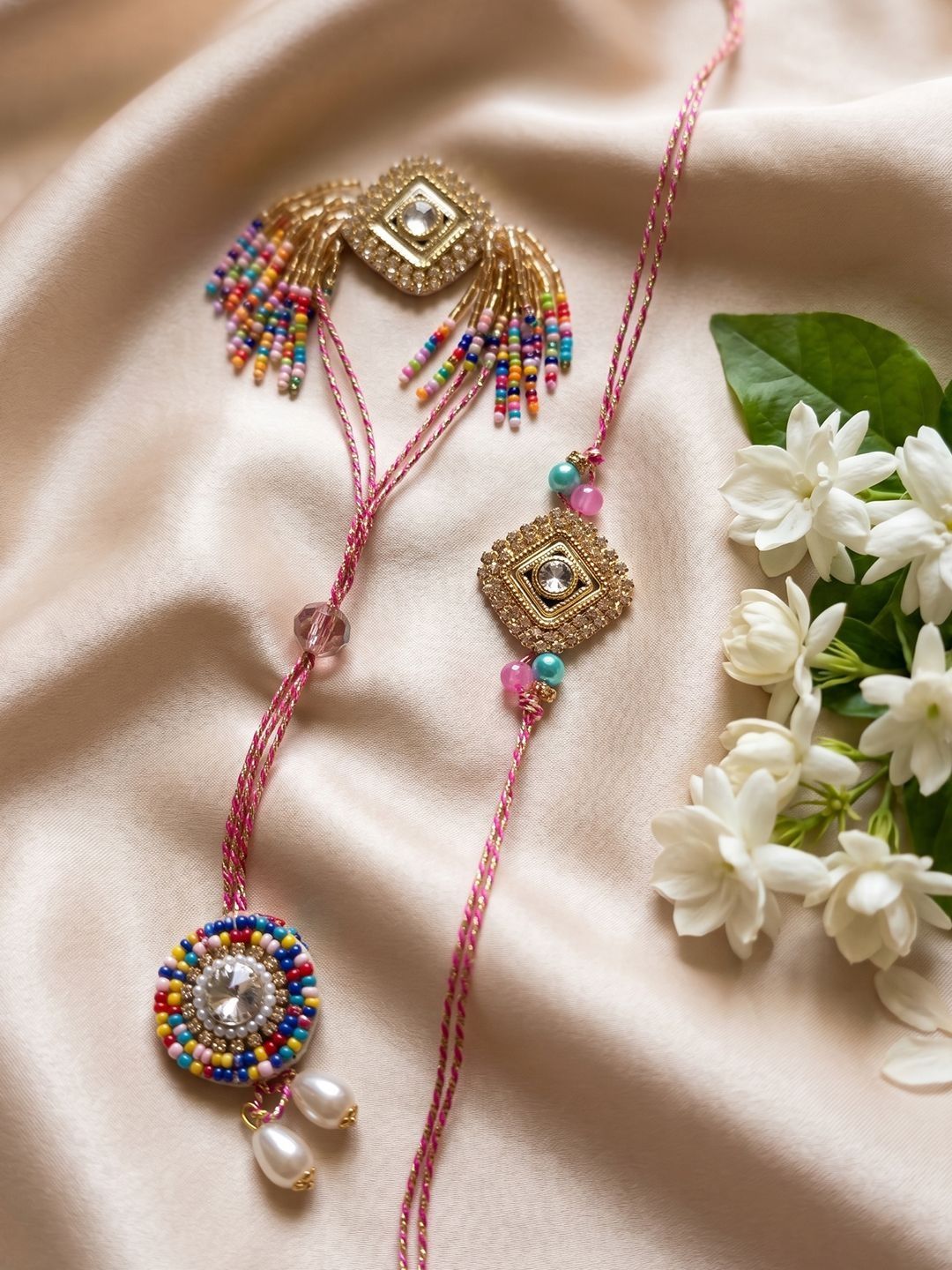 Anouk Set Of 2 White Artificial Stones Golden Toned Bhaiya Bhabhi Rakhi With Roli Chawal