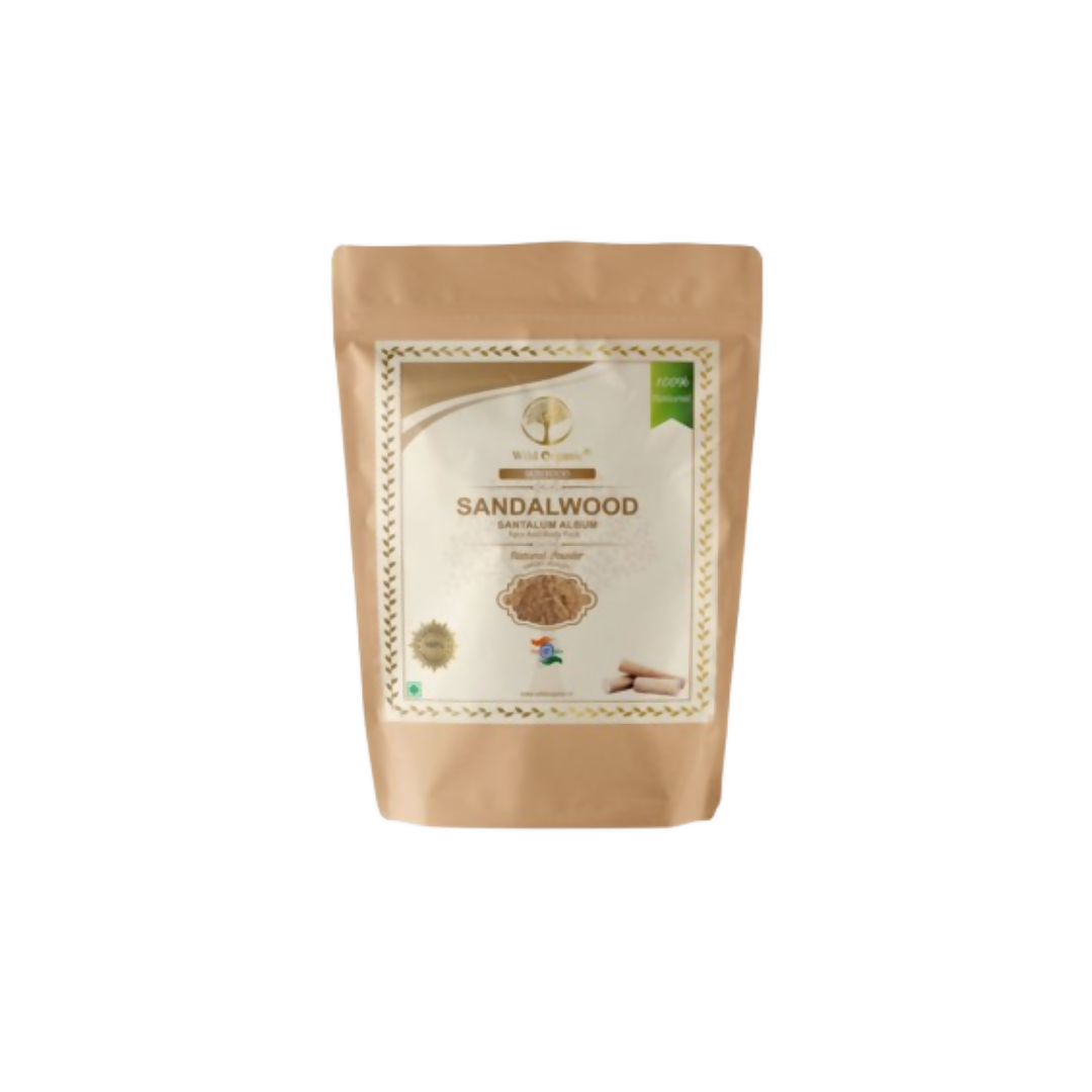 Wild Organic sandalwood powder face pack for skin and body, showing the natural powder in a container with a wooden spoon.