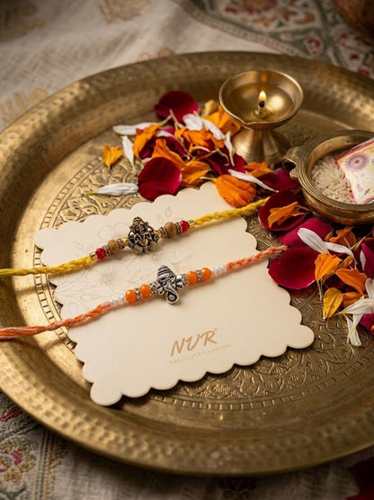 Anouk Set Of 2 Multicolor Religious Thread Rakhi With Roli Chawal Chandan Mishri