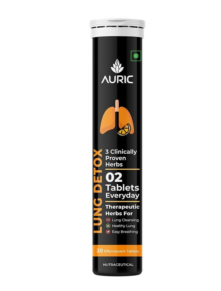 Auric Ayurvedic Lung Detox Effervescent Tablets in a clear glass with tablets dissolving, showcasing natural herbal ingredients.