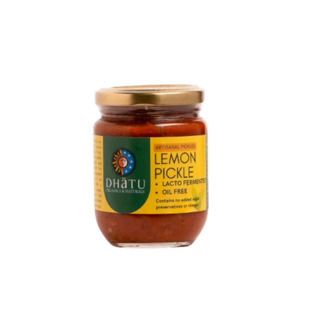 North Indian lemon pickle by Dhatu Organics & Naturals, showing a jar filled with vibrant yellow lemon pickle chunks