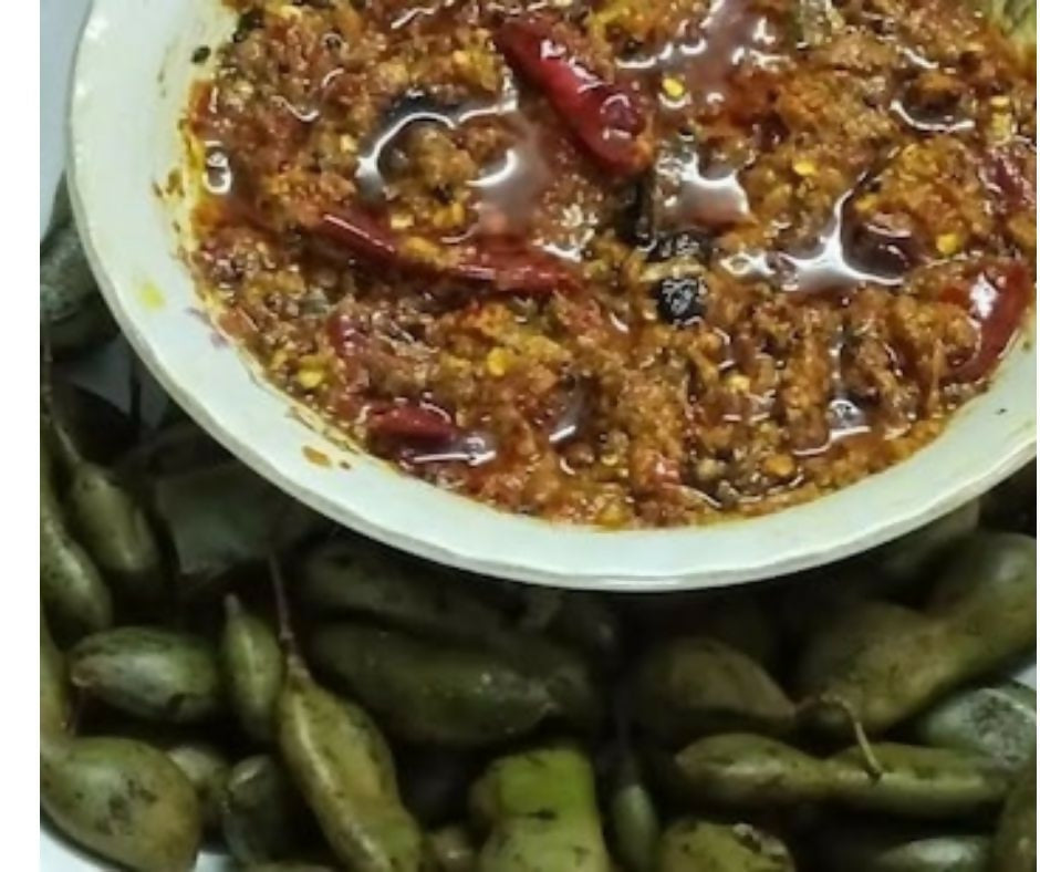 North Indian Konaseema Tamarind (Chinthakaya) Pickle by Konaseema Special Foods, showing a jar of spicy tamarind pickle.