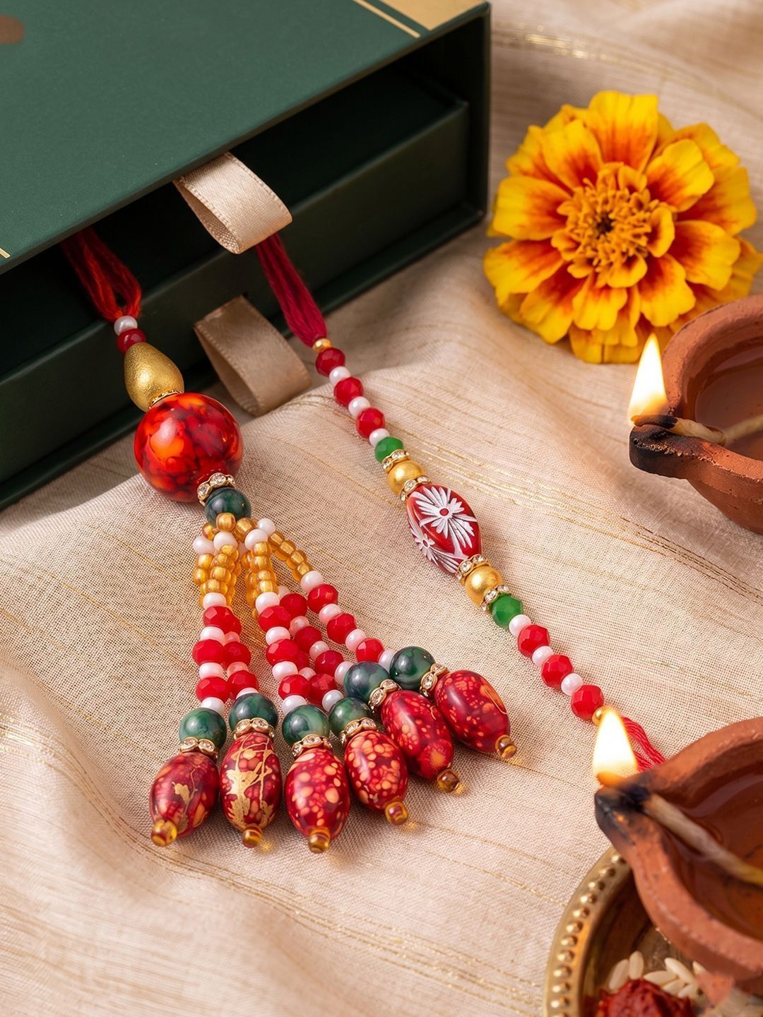 Anouk Set Of 2 Designer Red Artificial Beads Bhaiya Bhabhi Rakhi With Roli Chawal Chandan