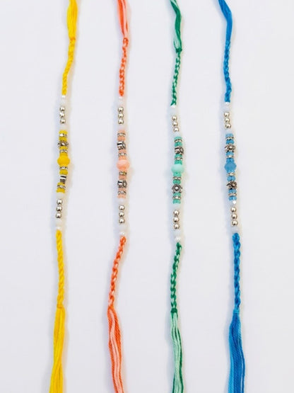 Anouk Set Of 4 Multicolor Artificial Beads Thread Rakhi With Roli Chawal Chandan Mishri