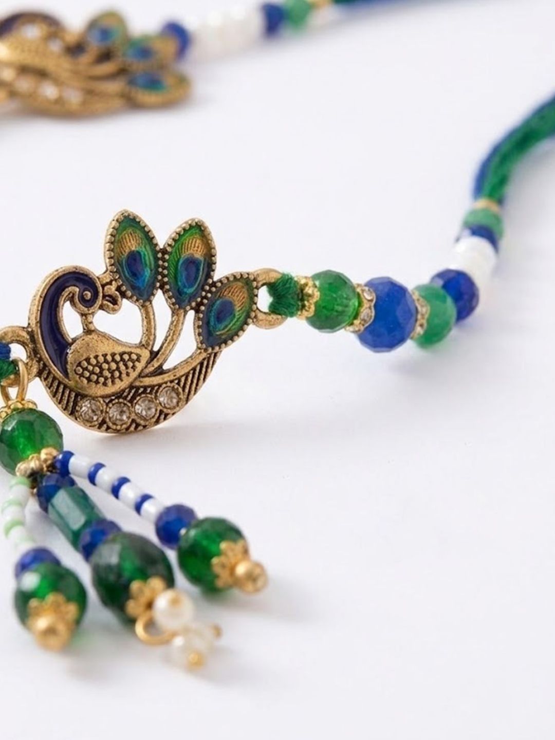 Anouk Set Of 4 Green Peacock Design Artificial Beads Thread Rakhi With Roli Chawal